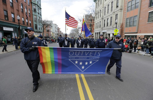 FILE - In this March 20, 2016 file photo, members of OutVets, a group of gay military veterans, march in the annual St. Patrick's Day Parade in Boston's South Boston neighborhood. The group said Wednesday, March 8, 2017, it was denied permission to march in the 2017 Boston St. Patrick's Day parade just two years after organizers made the ground-breaking decision to allow gay groups to participate for the first time. (AP Photo/Steven Senne, File)